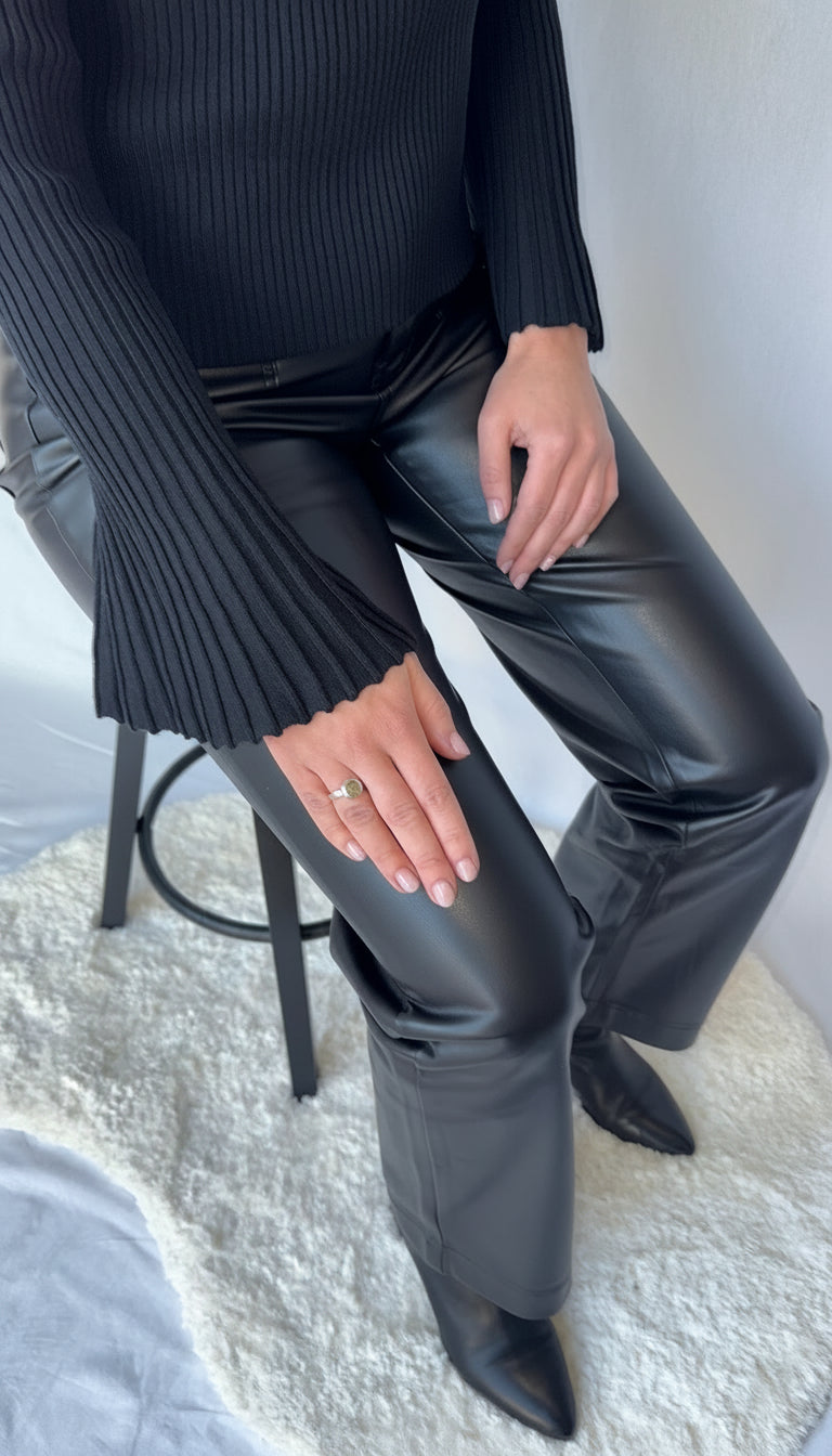 “Flare Rib Sweater”